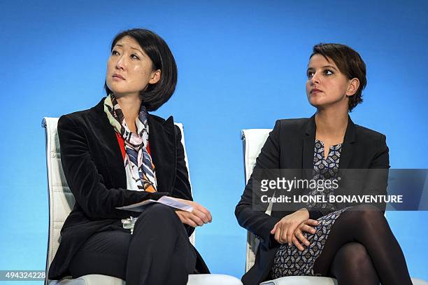French Education minister Najat Vallaud-Belkacem and French Culture minister Fleur Pellerin listen to France's Prime Minister during a visit in the...