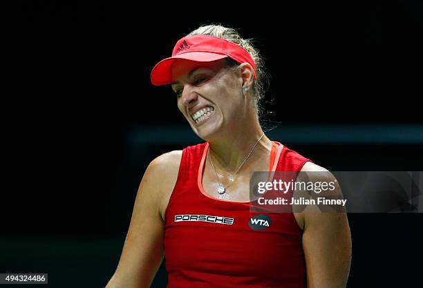 Angelique Kerber of Germany reacts during her round robin match against Petra Kvitova of Czech Republic during the BNP Paribas WTA Finals at...