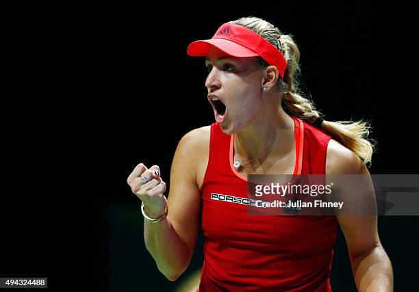 Angelique Kerber of Germany reacts during her round robin match against Petra Kvitova of Czech Republic during the BNP Paribas WTA Finals at...
