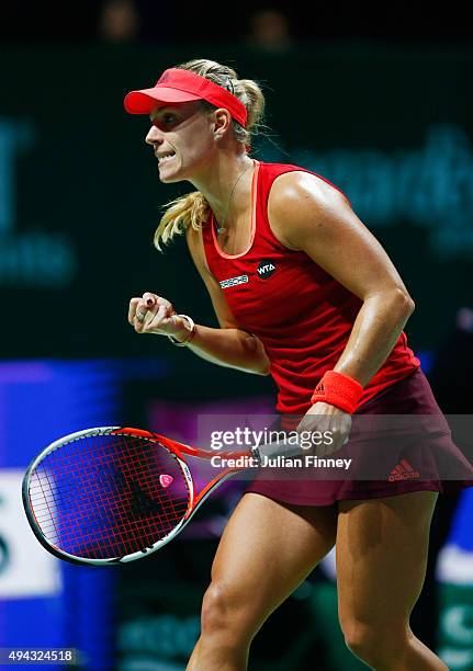 Angelique Kerber of Germany reacts during her round robin match against Petra Kvitova of Czech Republic during the BNP Paribas WTA Finals at...