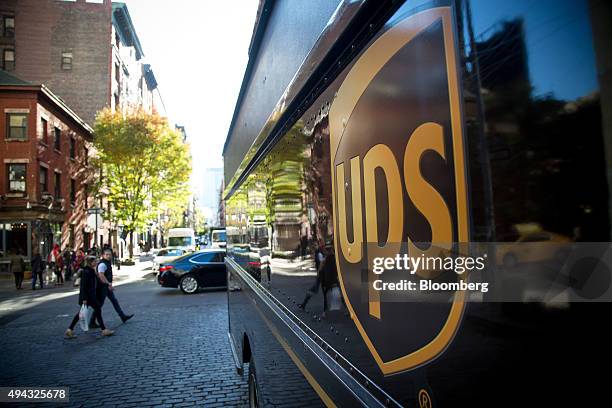 The United Parcel Service Inc. Logo is displayed on a truck parked in New York, U.S., on Friday, Oct. 23, 2015. UPS is scheduled to release...