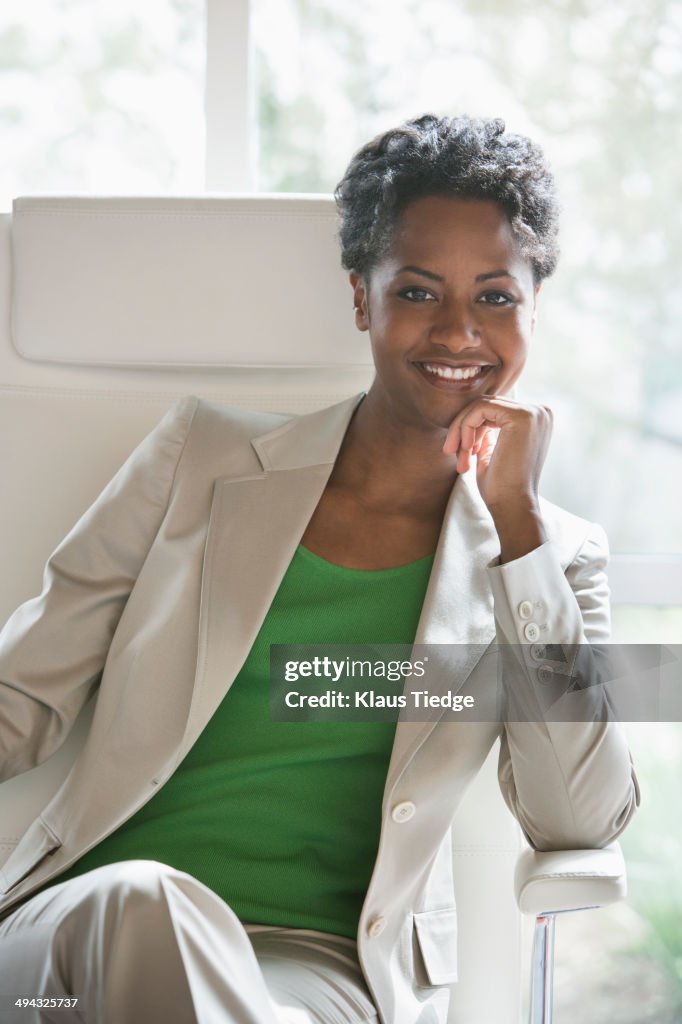 Businesswoman smiling in office