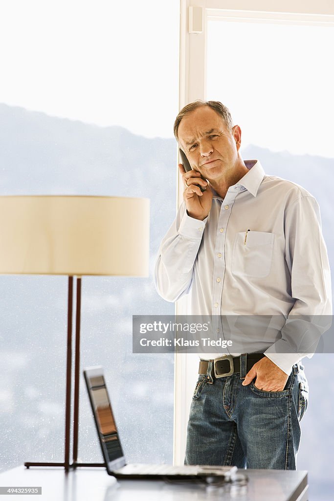 Businessman talking on cell phone