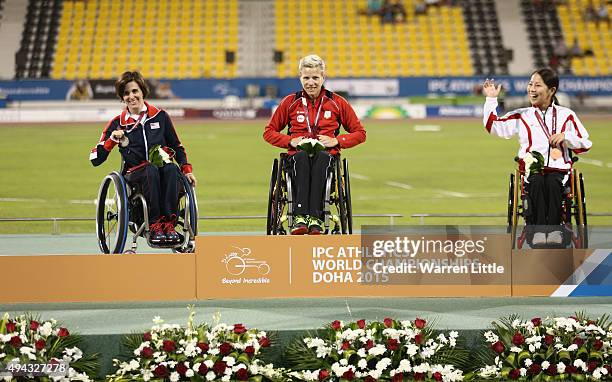 Marieke Vervoort of Belgium poses with her gold medal, Kerry Morgan of USA silver and Yuka Kiyama of Japan bronze after the women's 100m T52 final...