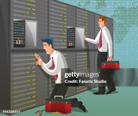 Computer technicians working in server room Computer technicians working in server room