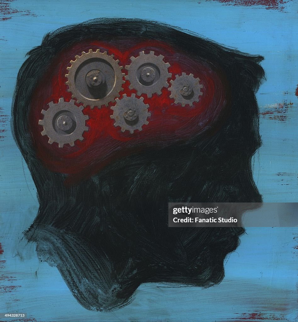 Human head with interlocked gear wheel