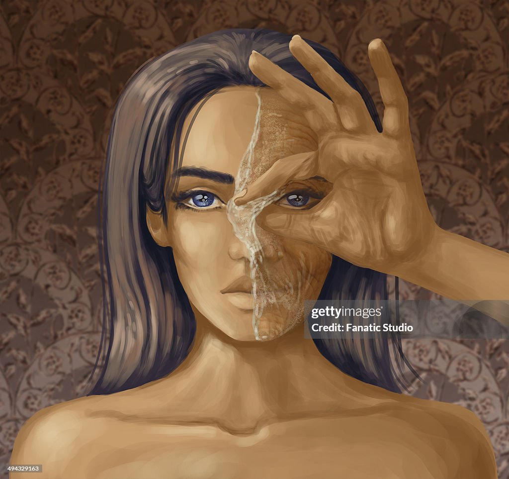 Portrait of a woman with hand peeling off the mask depicting concept of aging process