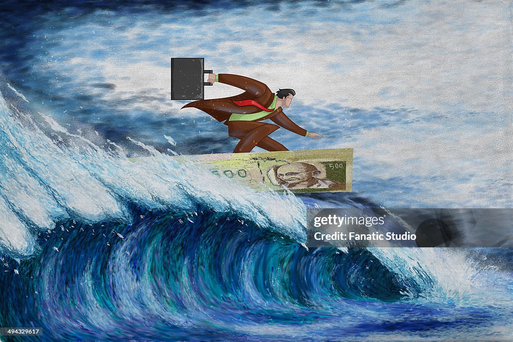 Illustrative image of businessman surfing on note representing conquering adversity