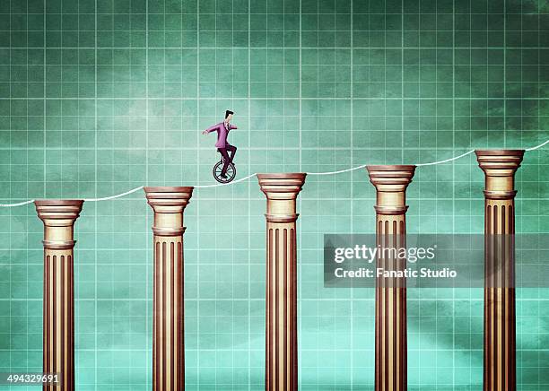 illustrative image of businessman cycling on rope and bar graph representing growth - hochseil stock-grafiken, -clipart, -cartoons und -symbole