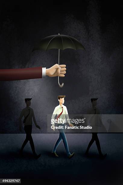 illustrative image of hand holding an umbrella above businessman representing life insurance - damages compensation stock-grafiken, -clipart, -cartoons und -symbole