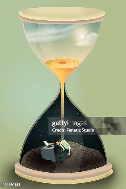 illustrative image of businessman in hourglass representing workaholic - glass layers office stock illustrations