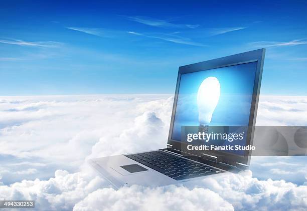 illustration of laptop over cloudscape showing lit bulb on screen representing cloud computing - laptop screen outside stock illustrations