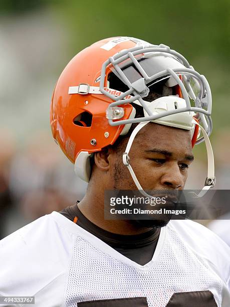 Linebacker Craig Robertson of the Cleveland Browns walks onto the field prior to an OTA practice at the Cleveland Browns training facility in Berea,...
