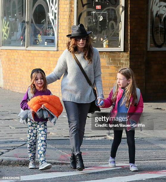 Sarah Jessica Parker with daughters Marion and Tabitha Broderick are seen on October 26, 2015 in New York City.