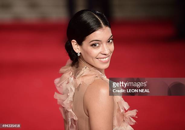 Mexican actress Stephanie Sigman poses on arrival for the world premiere of the new James Bond film 'Spectre' at the Royal Albert Hall in London on...