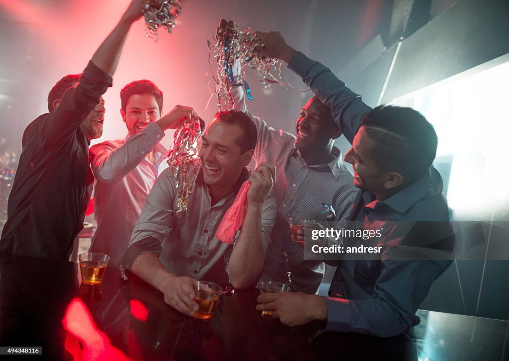 Happy group of men at a bachelor party