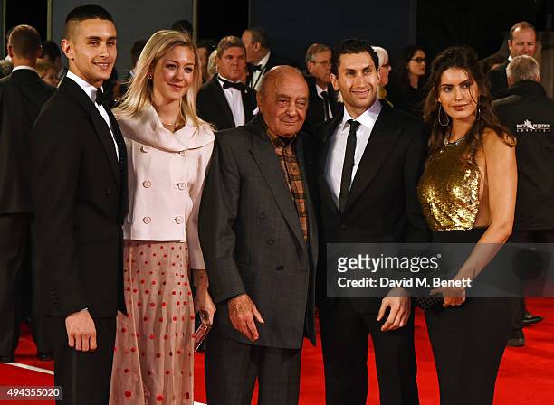 Omar Al-Fayed, guest, Mohamed Al-Fayed, Karim Al Fayed and Brenda Costa attend the Royal World Premiere of "Spectre" at Royal Albert Hall on October...