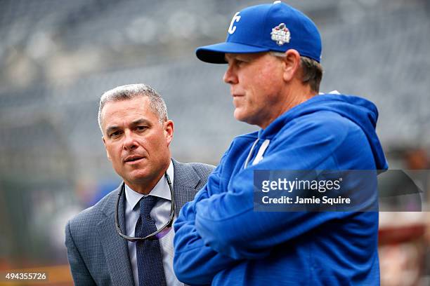 Dayton Moore, Senior Vice President Baseball Operations and General Manager of the Kansas City Royals talks with manager Ned Yost during a workout...