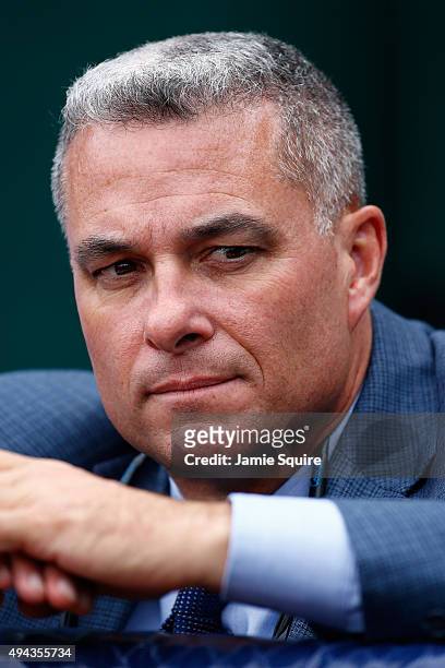 Dayton Moore, Senior Vice President Baseball Operations and General Manager of the Kansas City Royals looks on during a workout the day before Game 1...