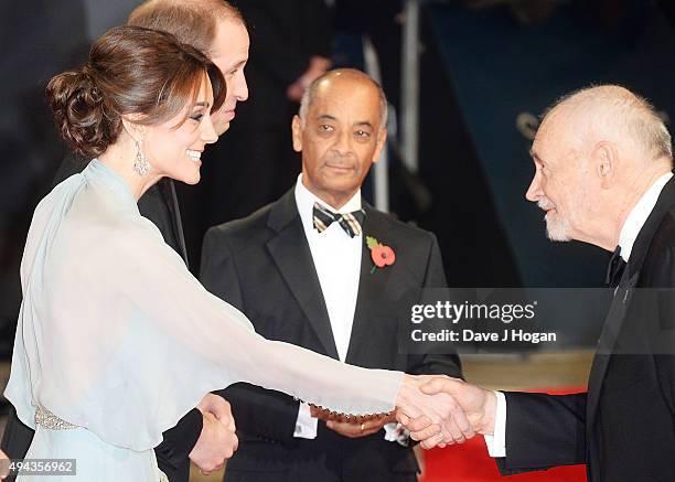 Catherine, Duchess of Cambridge and Prince William, Duke of Cambridge greet Michael G Wilson during the Royal World Premiere of 'Spectre' at Royal...