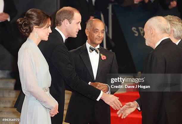 Catherine, Duchess of Cambridge and Prince William, Duke of Cambridge greet Michael G Wilson during the Royal World Premiere of 'Spectre' at Royal...
