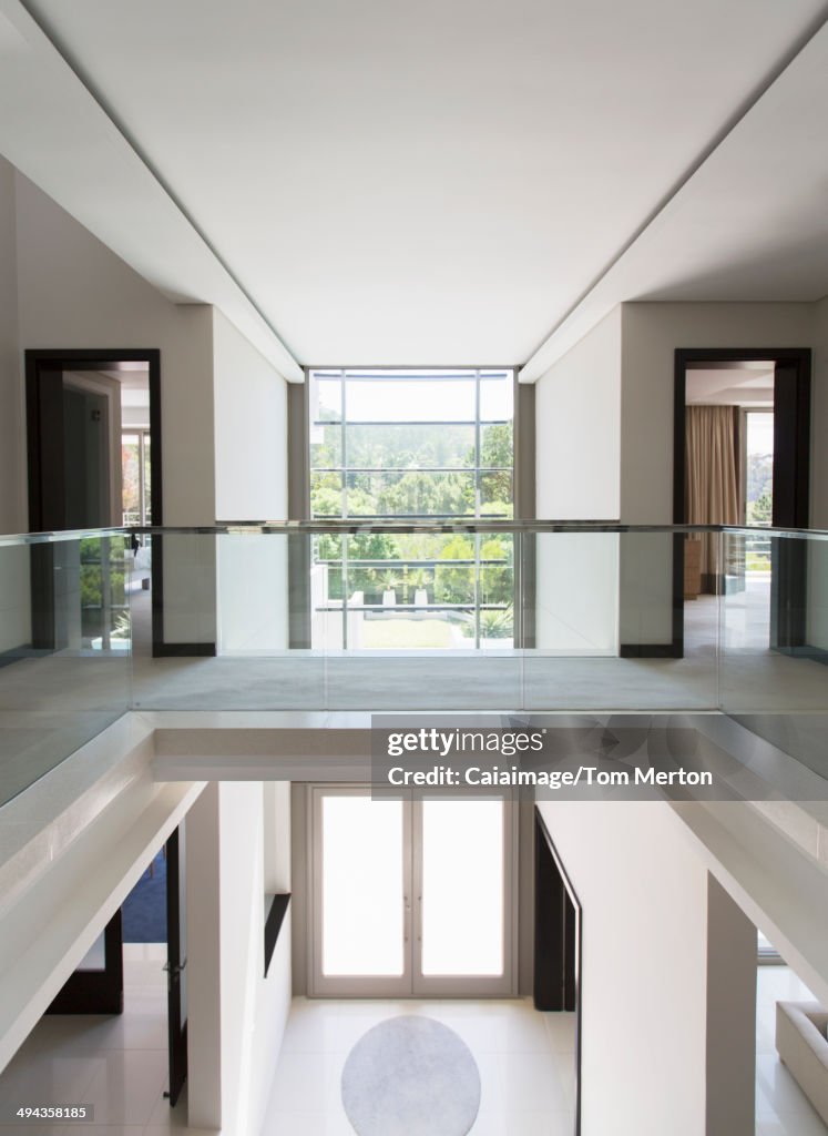 Modern balcony and open foyer in luxury home