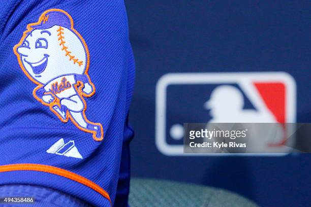 The New York Mets logo is seen on the sleeve of Matt Harvey as he addresses the media the day before Game 1 of the 2015 World Series between the...