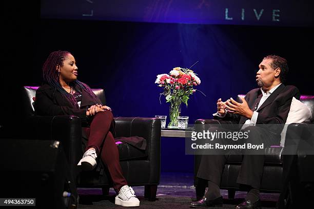 Singer Lalah Hathaway is interviewed by host Dedry Jones during 'The Experience With Lalah Hathaway' at the DuSable Museum on October 23, 2015 in...