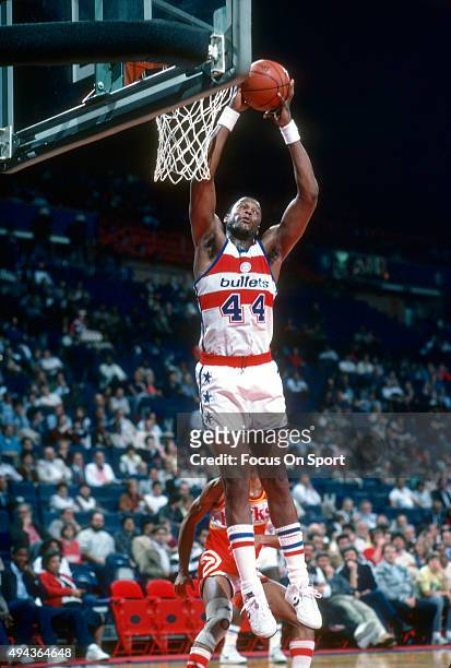 Rick Mahorn of the Washington Bullets grabs a rebound against the Atlanta Hawks during an NBA basketball game circa 1983 at the Capital Centre in...