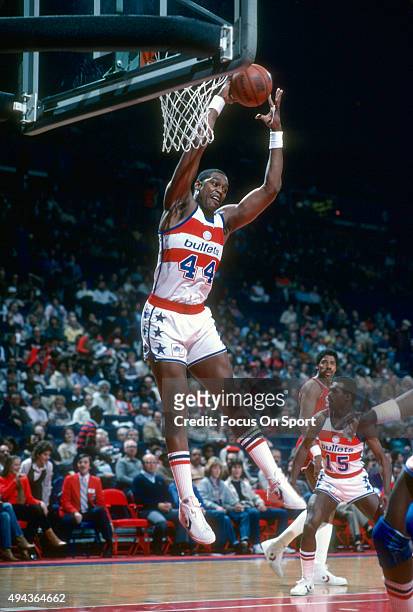 Rick Mahorn of the Washington Bullets grabs a rebound against the Philadelphia 76ers during an NBA basketball game circa 1983 at the Capital Centre...