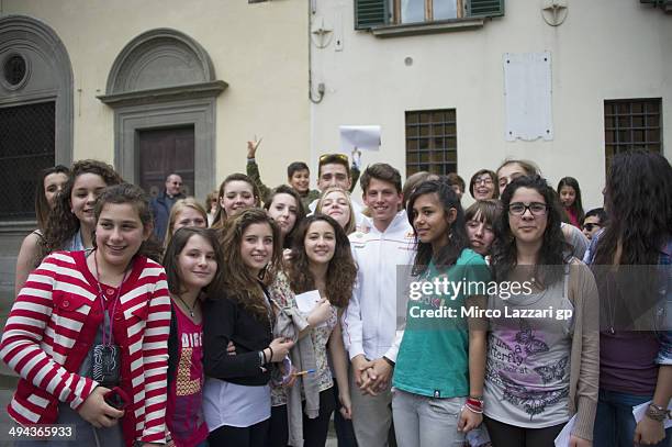 Matteo Ferrari of Italy and San Carlo Team Italia and Andrea Locatelli of Italy and san Carlo Team Italia poses with fans during the pre-event...