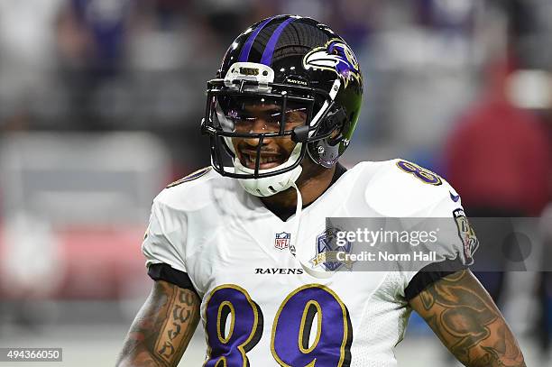 Wide receiver Steve Smith Sr. #89 of the Baltimore Ravens smiles on the field prior to the NFL game against the Arizona Cardinals at University of...