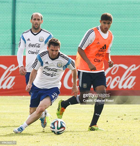 Lionel Messi of Argentina drives the ball during an Argentina training session at Ezeiza Training Camp on May 28, 2014 in Ezeiza, Argentina.
