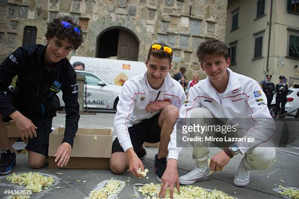 Francesco Bagnaia of Italy and Sky Racing Team By VR46, Matteo Ferrari of Italy and San Carlo Team Italia and Andrea Locatelli of Italy and San Carlo...