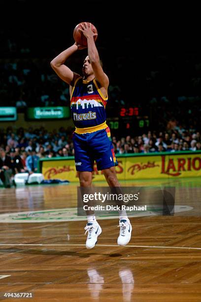 Mahmoud Abdul-Rauf of the Denver Nuggets shoots the ball against the Boston Celtics during a game played in 1992 at the Boston Garden in Boston,...