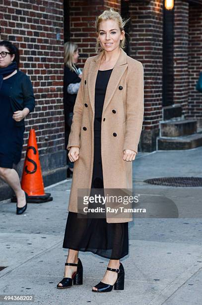 Actress Sienna Miller enters "The Late Show With Stephen Colbert" taping at the Ed Sullivan Theater on October 26, 2015 in New York City.
