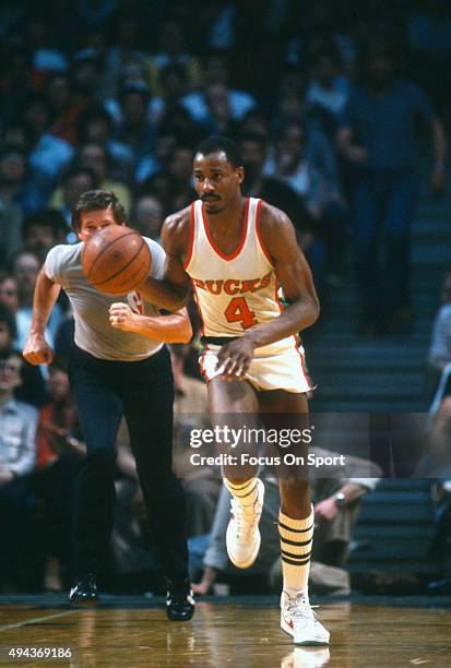 Sidney Moncrief of the Milwaukee Bucks dribbles the ball during an NBA basketball game circa 1983 at the MECCA Arena in Milwaukee, Wisconsin....