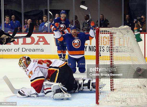 Mikhail Grabovski of the New York Islanders celebrates his powerplay goal at 14:01 of the second period against Joni Ortio of the Calgary Flames at...