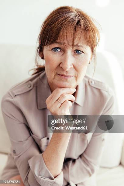 portrait of mature woman - woman 50s blue eyes stock pictures, royalty-free photos & images