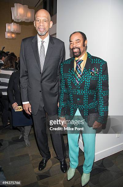 Former NBA stars Kareem Abdul-Jabbar and Walt Frazier attend the "Kareem: Minority Of One" New York premiere at Time Warner Center on October 26,...