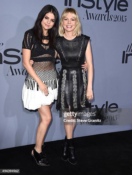 Selena Gomez and Michelle Williams arrives at the InStyle Awards at Getty Center on October 26, 2015 in Los Angeles, California.