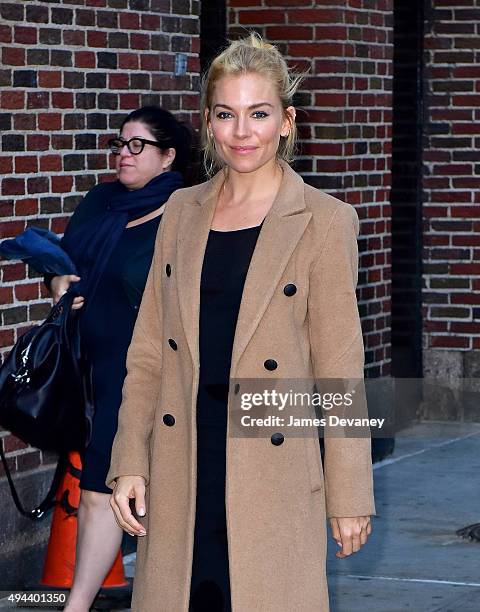 Sienna Miller arrives to "The Late Show With Stephen Colbert" at Ed Sullivan Theater on October 26, 2015 in New York City.