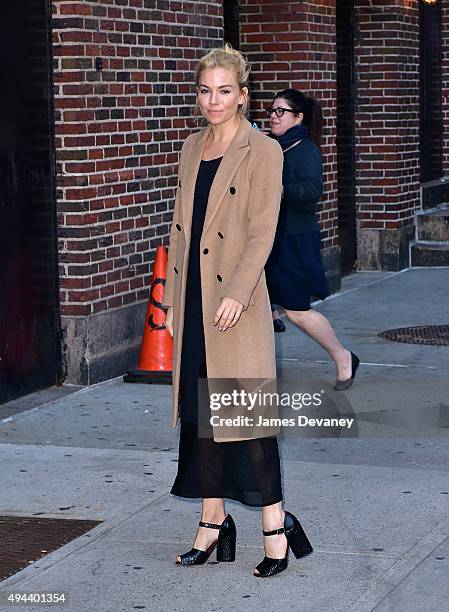 Sienna Miller arrives to "The Late Show With Stephen Colbert" at Ed Sullivan Theater on October 26, 2015 in New York City.