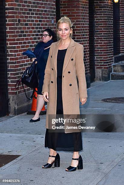 Sienna Miller arrives to "The Late Show With Stephen Colbert" at Ed Sullivan Theater on October 26, 2015 in New York City.