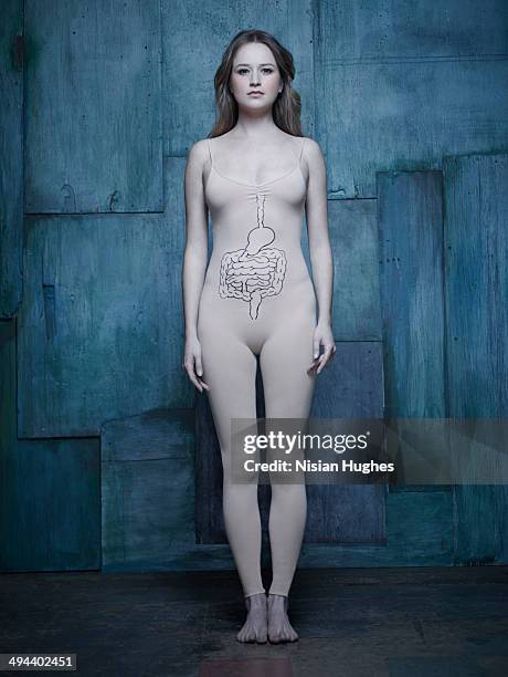 woman in body suit with intestine illustration - bodysuit stock-fotos und bilder