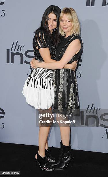 Actress Selena Gomez and actress Michelle Williams arrive at the InStyle Awards at Getty Center on October 26, 2015 in Los Angeles, California.