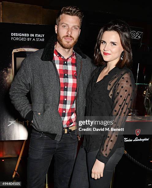 Rick Edwards and Emer Kenny attend the launch of the Tonino Lamborghini Antares Smartphone at No. 41 Mayfair on May 29, 2014 in London, England.