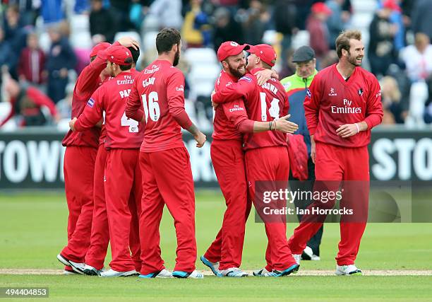 Lancashire Lightning players celebrate winning the game by one run during The Natwest T20 Blast match between Durham Jets and Lancashire Lightning at...