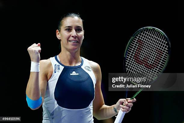 Flavia Pennetta of Italy celebrates match point against Agnieszka Radwanska of Poland in a round robin match during the BNP Paribas WTA Finals at...