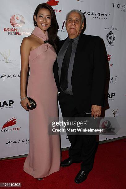 Actress Sumire Matsubara and director/producer Georges Chamchoum arrive at the Asian World Film Festival opening night red carpet awards gala and...
